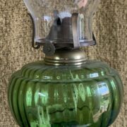 Victorian Green Glass font with cast iron base oil lamp