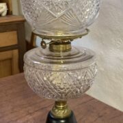 American oil lamp c1910, moulded glass font, matching shade