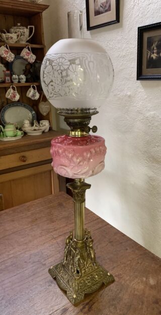 Victorian Boy Flower Seller Oil Lamp, pink to cranberry embossed vaseline glass font