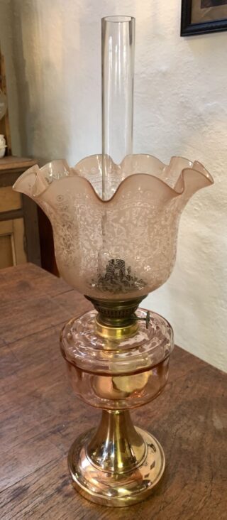 Pink/Peach oil lamp marked B.M. Lamp on base