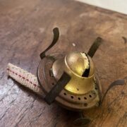 A burner solid brass with wick