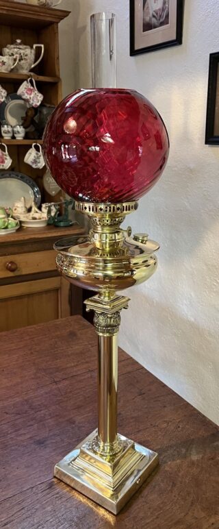 Brass Table oil lamp red swirl shade